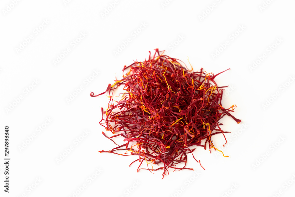 Fototapeta premium Dried saffron spice isolate on white background. Aroma spice.