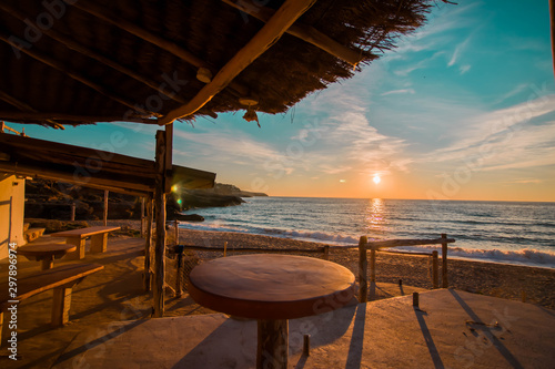 Fototapeta Naklejka Na Ścianę i Meble -  Magical views of beach from a restaurant in Ibiza