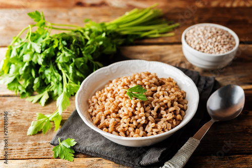 Barley porridge decorated with parsley leaves