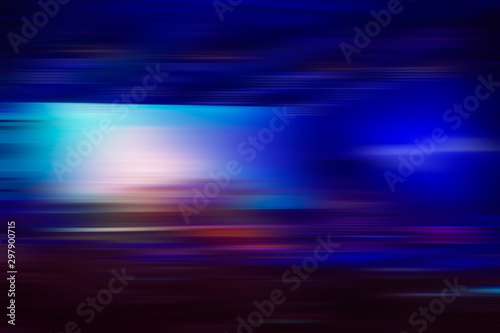 Abstract blurred background of multicolored horizontal lines of light and blue spots.