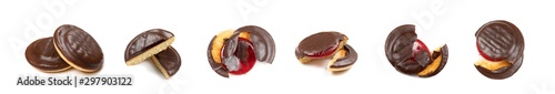 Round chocolate jaffa cake or biscuit cookie filled with natural jam photo