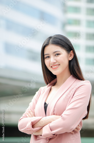 Outdoors portrait of beautiful young Asian woman smiling happy Free Download Outdoors portrait of beautiful young Asian woman smiling happy - GFXLoad