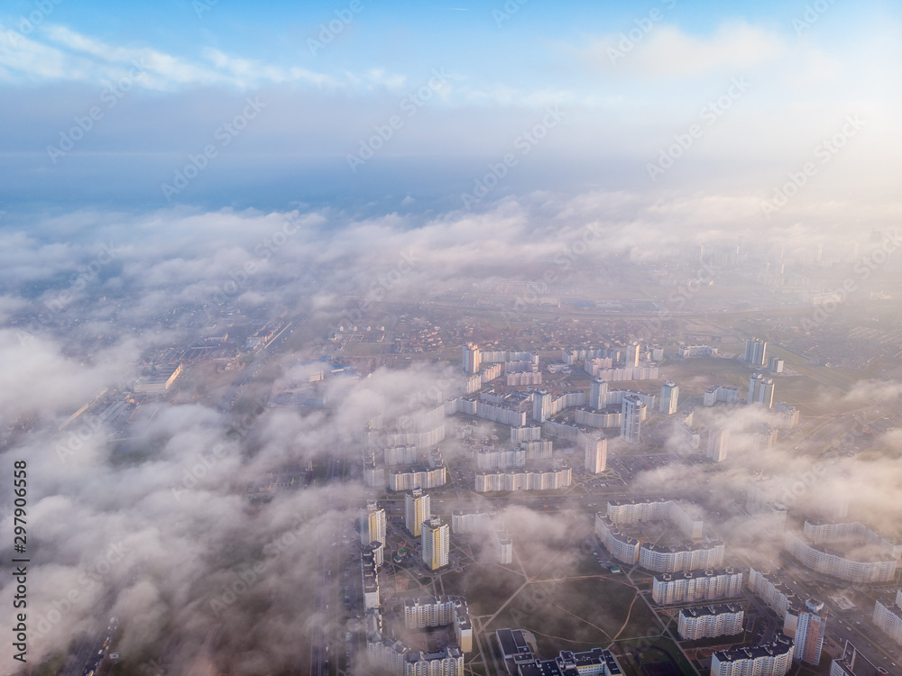 Flying above Minsk and clouds, Belarus. Drone aerial photo