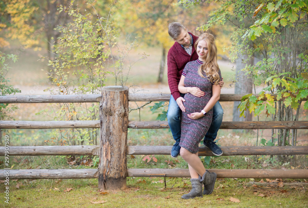 A portrait of young married couple expecting a baby A portrait of young married couple expecting a baby