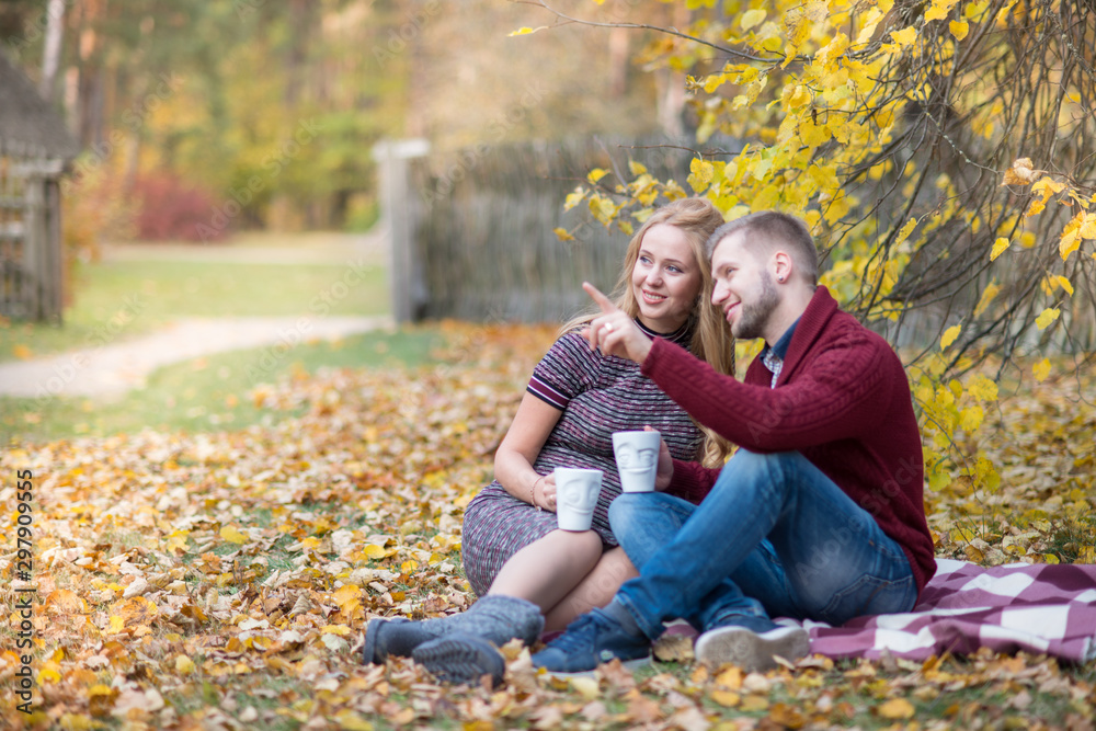 A portrait of young married couple expecting a baby A portrait of young married couple expecting a baby