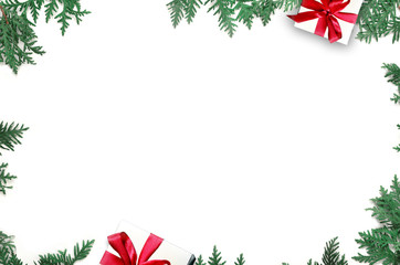 Fir branch and gift on white background with copy space for text. Christmas