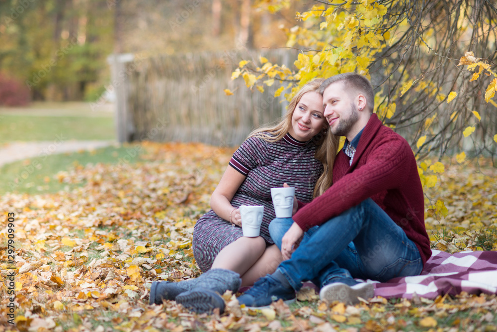 A portrait of young married couple expecting a baby A portrait of young married couple expecting a baby