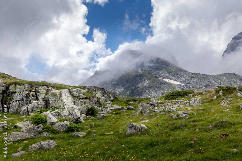 Breathtaking landscape with dramatic sky at Rila mountain in Bulgaria.