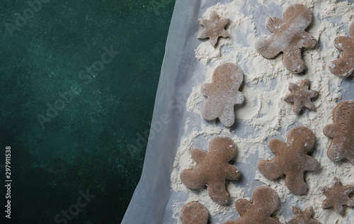 Gingerbread man flat lay with copy space for Christmas baking concept.