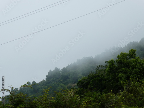 hill landscape with fog and clouds