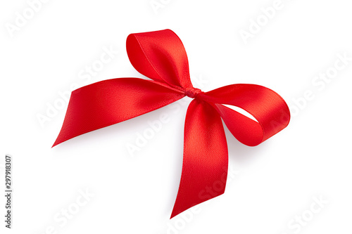 Side view of a beautiful red bright shiny holiday gift bow tied from a satin ribbon isolated on white background