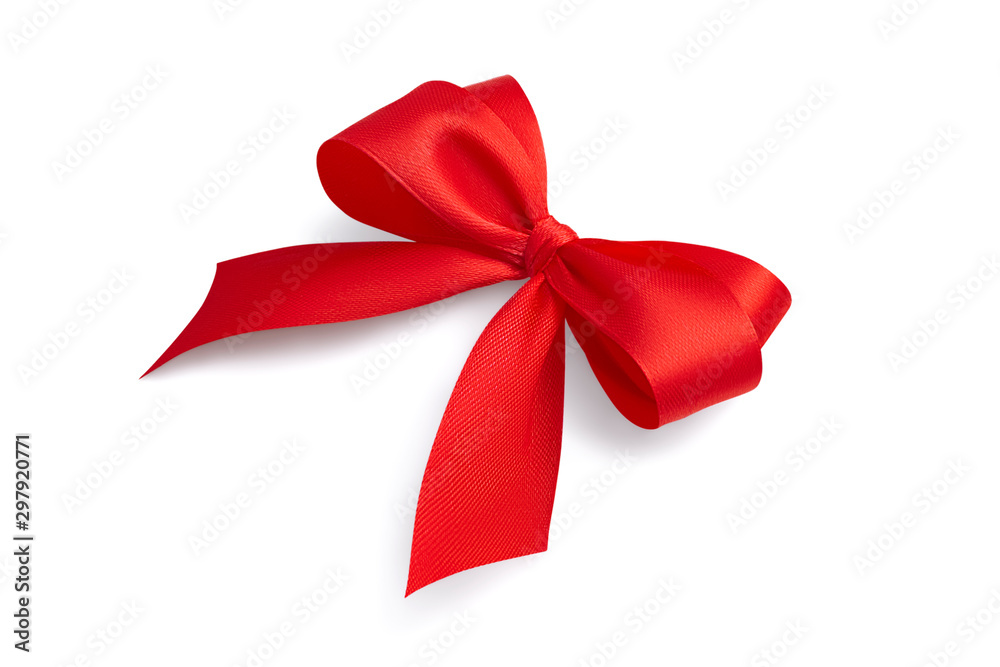 Side view of a beautiful red bright festive four-loop satin ribbon gift bow with gray light soft shadow isolated on white background Side view of a beautiful red bright festive four-loop satin ribbon gift bow with gray light soft shadow isolated on white background
