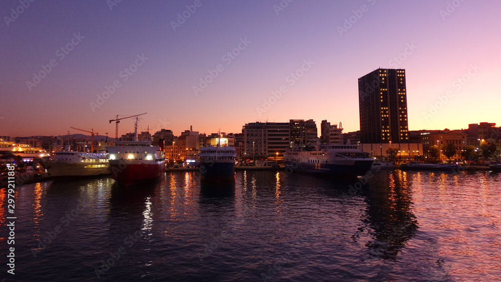 Busy port of Piraeus at dawn with beautiful sky colours, Attica, Greece