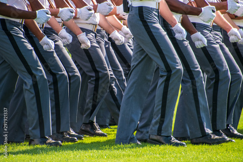 Lower body view of the gray uniform pants of Army cadets as they march photo