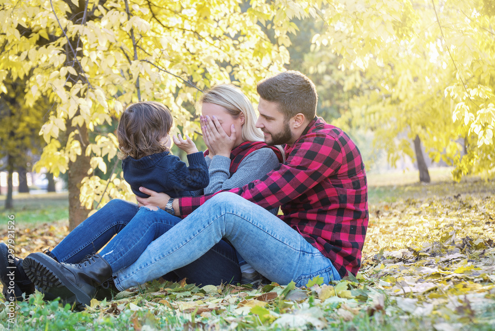 Young family having fun outdoors, autumn, Young family having fun outdoors, autumn,