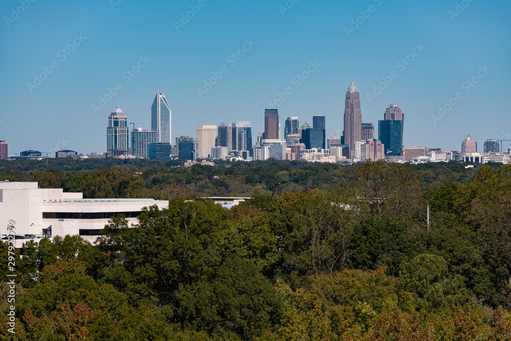 Charlotte, North Carolina city skyline in early autumn with blue skies