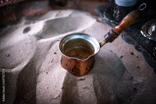 Turkish coffee preparing in the sand, Arabic style coffee preparing with sands