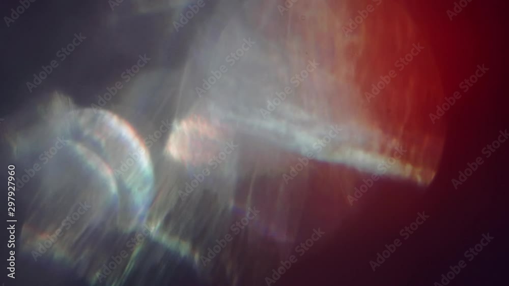 Light passes through glass, crystalline reflections from a prism