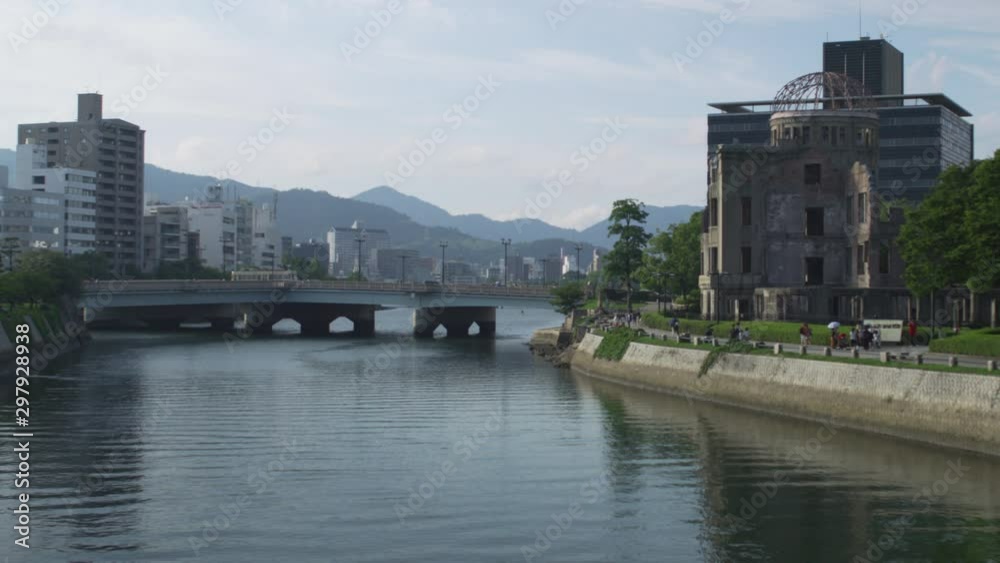 Timelapse of Hiroshima Peace Memorial Genbaku Dome Beautiful Afternoon Bridge and Moving Clouds