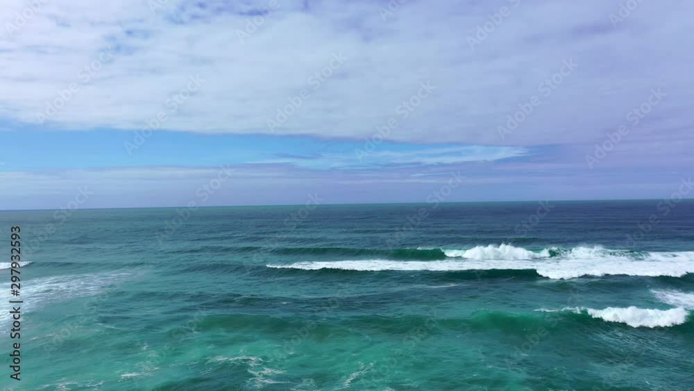 Amazing blue water of the Atlantic ocean at the Portuguese coast line - aerial drone footage Amazing blue water of the Atlantic ocean at the Portuguese coast line - aerial drone footage