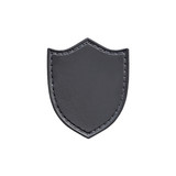 Leather patch in the form of a shield isolated on white background. Chevron