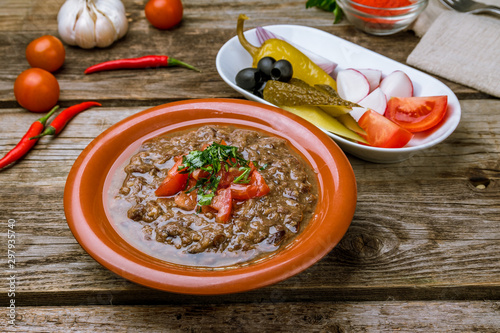 ful Lebanese cuisine on wooden table photo