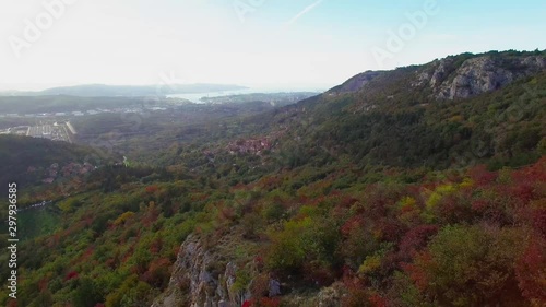 Aerial drone view of amazing autumn colors in fall forest. Val Rosandra (Glinscica) Trieste Italy photo