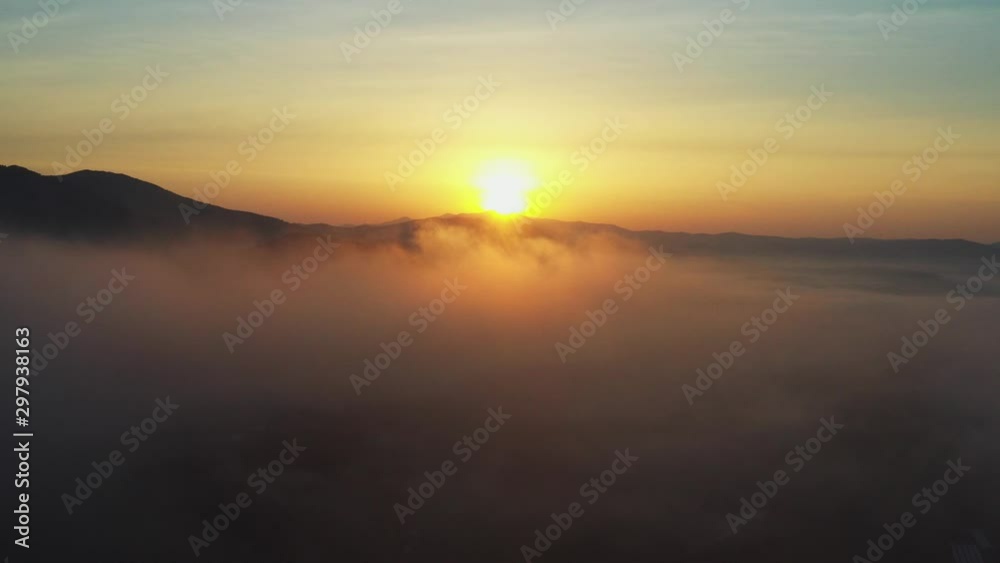 Flying in the middle of the clouds - dawn over the sea and mountains, Primorsky Krai, Russia Flying in the middle of the clouds - dawn over the sea and mountains, Primorsky Krai, Russia
