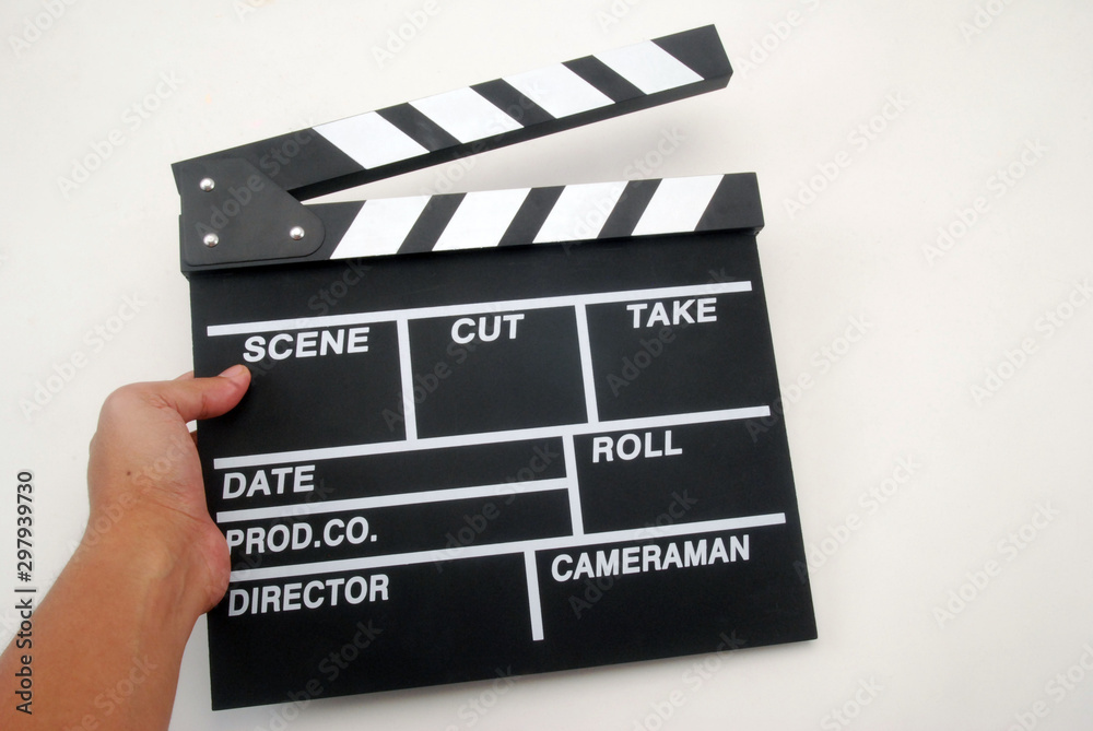 hand hold director clapper board on white background