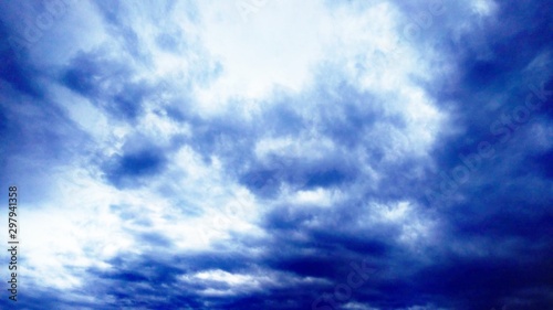 Natural light from the sun with blue sky and white clouds.