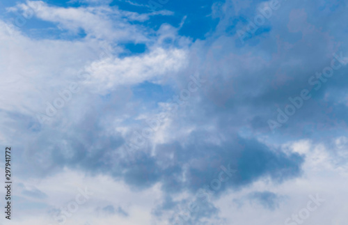 Natural light from the sun with blue sky and white clouds.