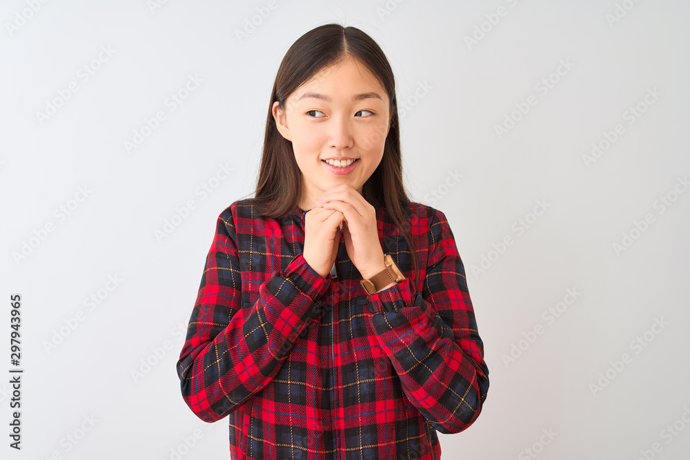 Young chinese woman wearing casual jacket standing over isolated white background laughing nervous and excited with hands on chin looking to the side Young chinese woman wearing casual jacket standing over isolated white background laughing nervous and excited with hands on chin looking to the side