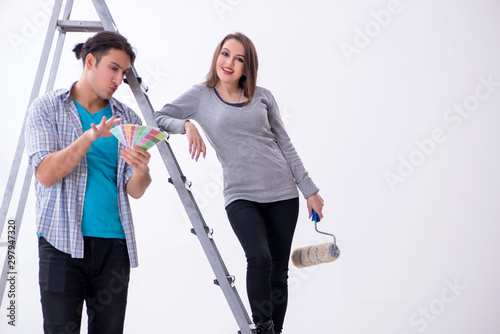 Young family doing renovation at home