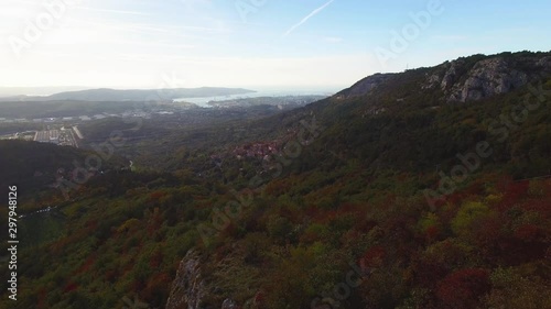 Aerial drone view of amazing autumn colors in fall forest. Val Rosandra (Glinscica) Trieste Italy photo
