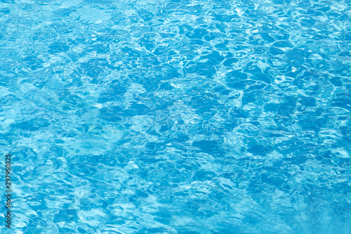 Overhead view. Swimming pool bottom caustics ripple and flow with waves background. Summer background