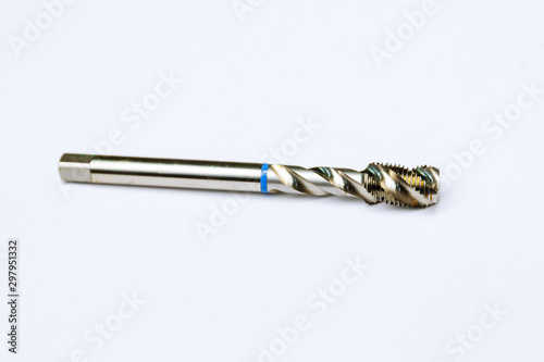 Tap for threading in metal. Tool for metal processing.