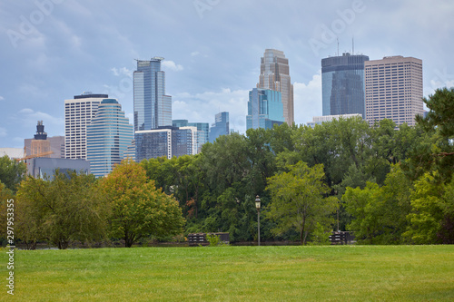 Minneapolis Minnesota skyline on summer day looking across a field and the Mississippi River © Jill Greer