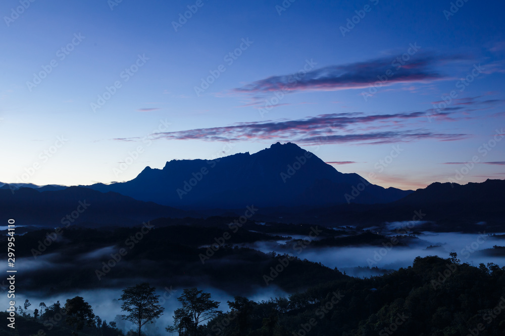 Amazing Beautiful Nature landscape view of Sunrise with nature misty foggy and Mount Kinabalu, Sabah, Borneo Amazing Beautiful Nature landscape view of Sunrise with nature misty foggy and Mount Kinabalu, Sabah, Borneo