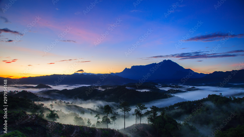 Amazing Beautiful Nature landscape view of Sunrise with  nature misty foggy and Mount Kinabalu, Sabah, Borneo