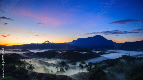 Amazing Beautiful Nature landscape view of Sunrise with nature misty foggy and Mount Kinabalu, Sabah, Borneo