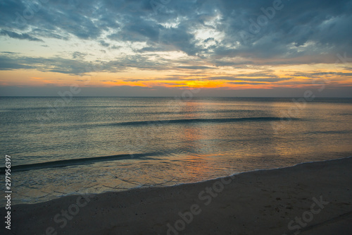 Fototapeta Naklejka Na Ścianę i Meble -  Siluette sunset at the beach background
