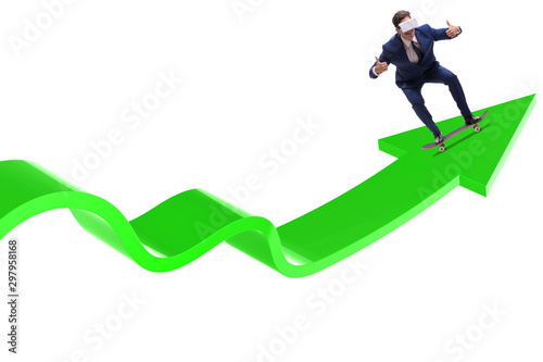 Businessman riding skateboard on financial graph © Elnur