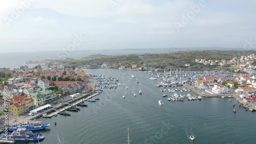 Drone flight over a busy yacht harbour photo