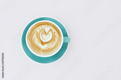 Hot coffee cappuccino latte art isolated on table 