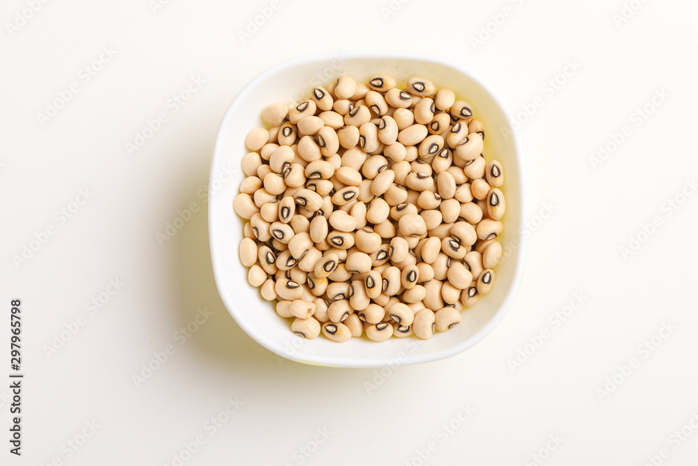 Black eyed seeds or chawali seeds in glass bowl on white background Black eyed seeds or chawali seeds in glass bowl on white background