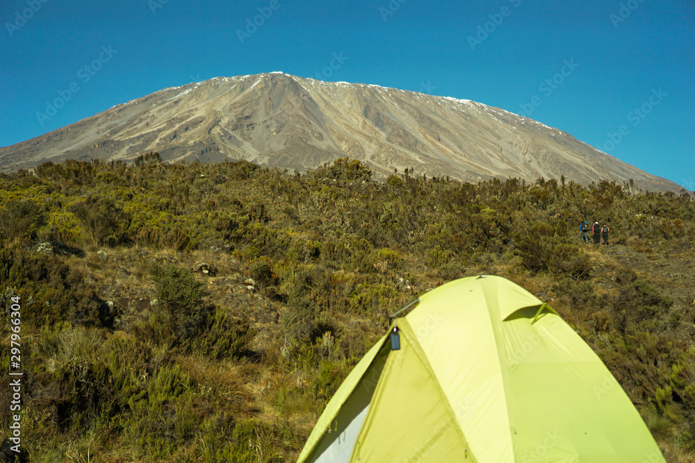 Camping spot on the mountain on the way up Kilimanjaro Mountain in Tanzania blue sky