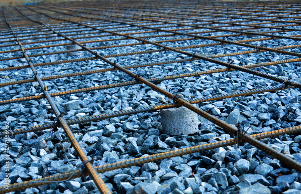 Steel rebar for reinforced concrete floor. Factory internal road and