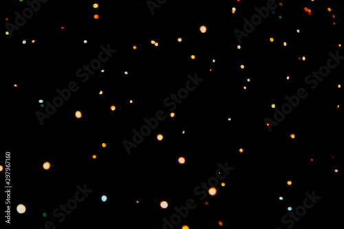 Abstract defocused round colorful light with black background