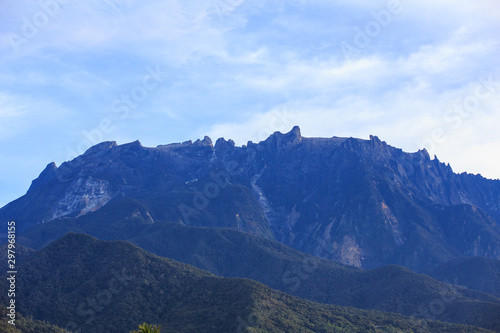 Amazing beautiful scenery view of the greatest  Mount Kinabalu Sabah, Borneo Island with local village house view from Kundasang Town, Sabah, Borneo © alenthien