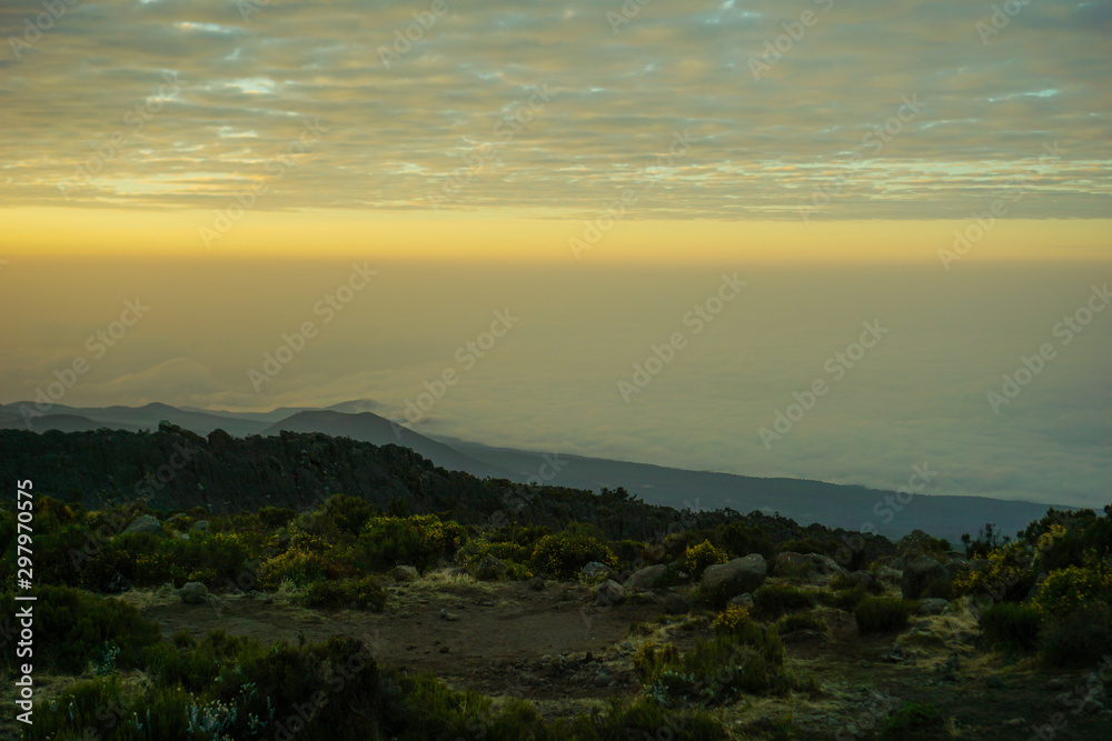 Morning mist, while the sun is rising Kilimanjaro Mountain in Tanzania background texture